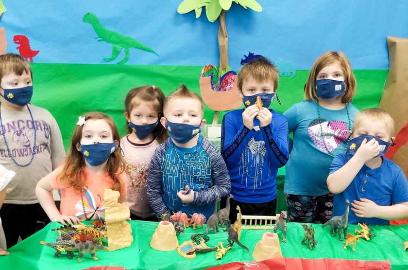 Children wearing masks.