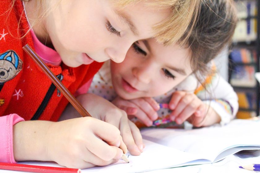 Two girls studying together.