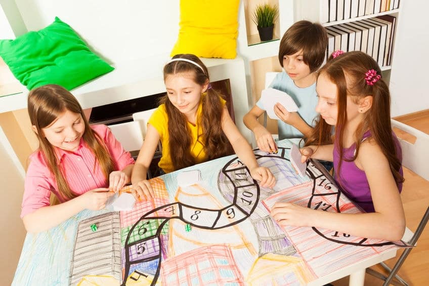 Children playing a board game.