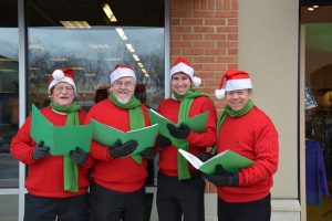 old men singing Christmas carols 